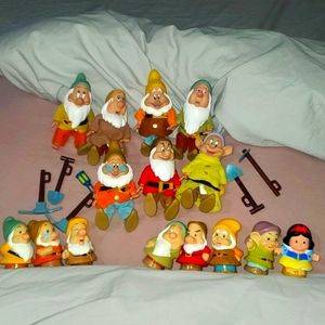 2 disney snow white dwarves sets.